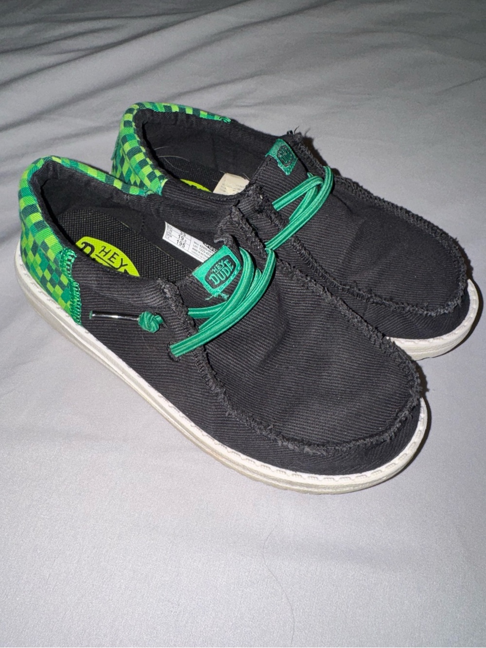 Hey Dude Black Sneakers with Green Accents